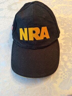 NRA Embroidered Black Cap with Gold Lettering